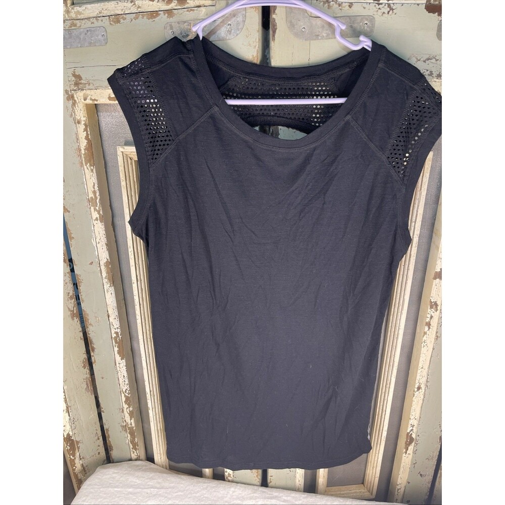 RBX performance women’s size L black muscle shirt tank top with vent accents